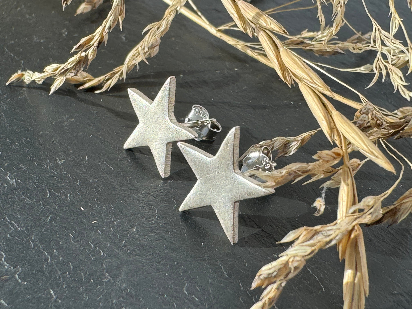 Fine silver star stud earrings