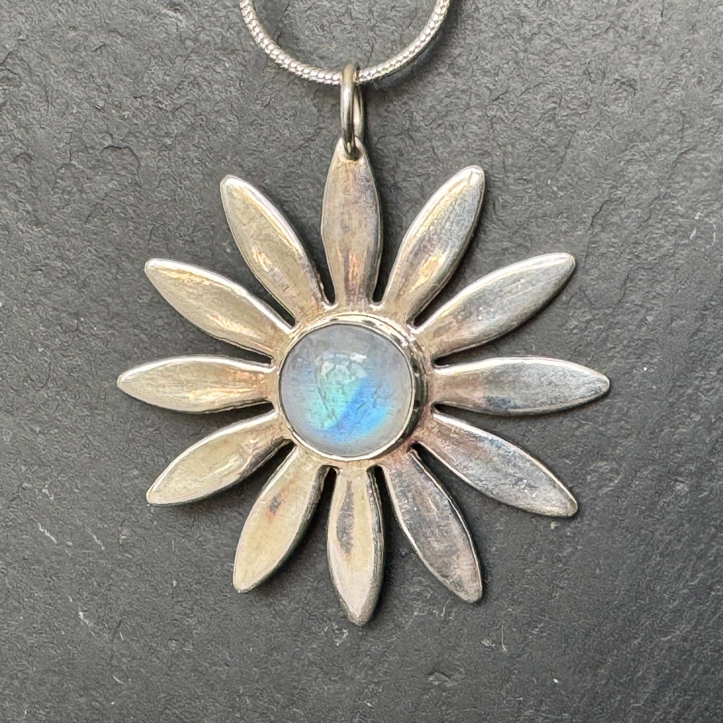 Silver daisy with moonstone pendant necklace