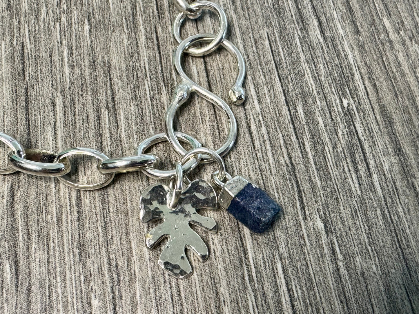 Sterling Silver Charm and Gem bracelet