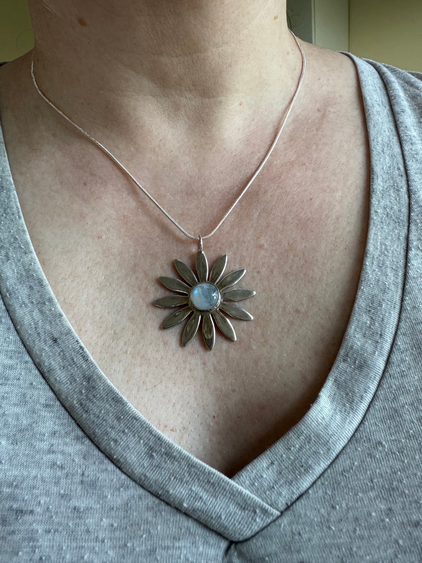 Silver daisy with moonstone pendant necklace
