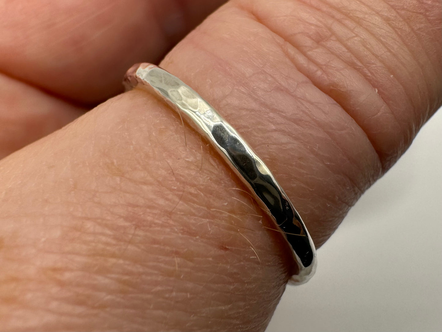 Thin handmade 'rugged' hammered sterling silver ring