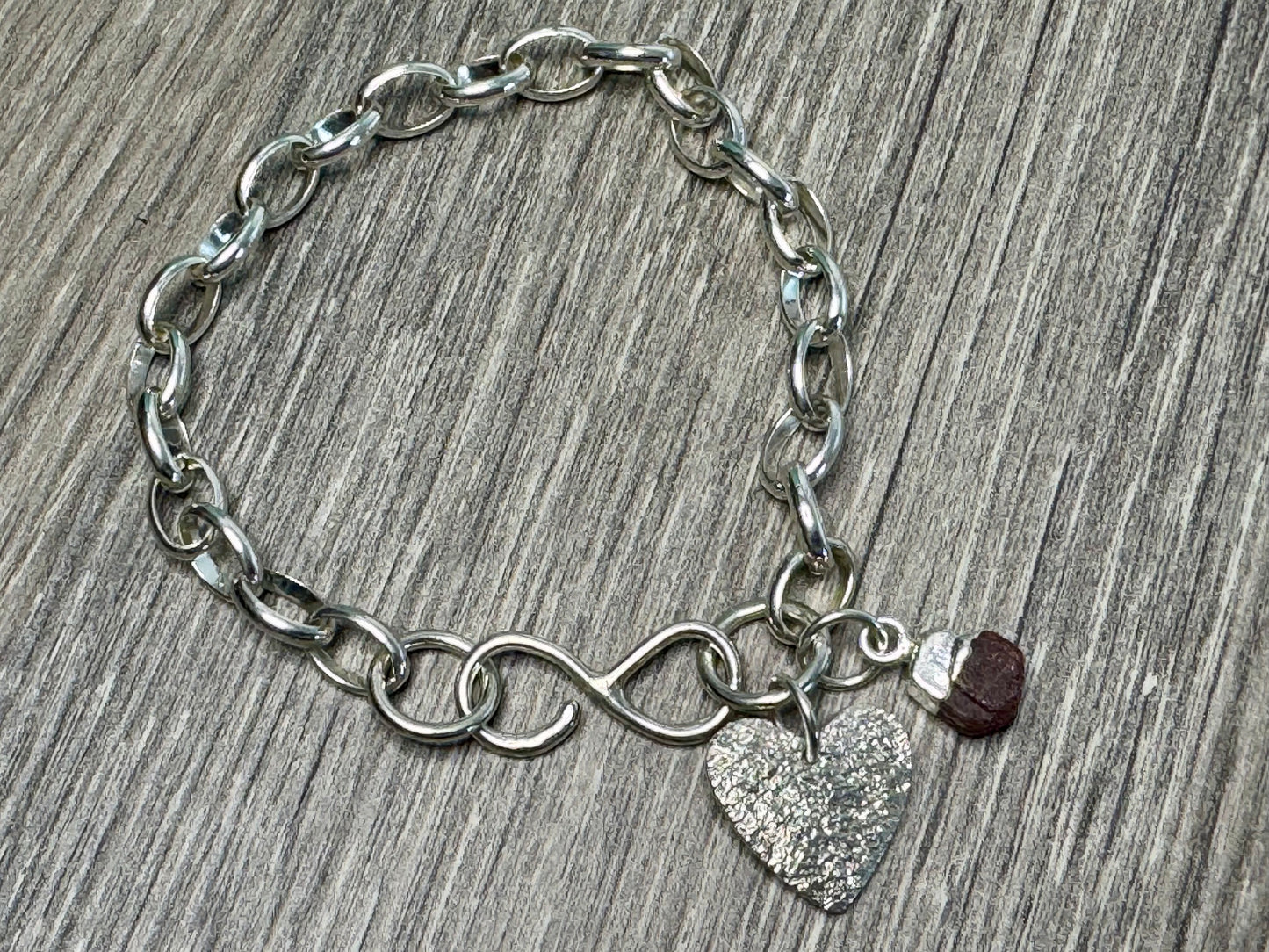 Sterling Silver Charm and Gem bracelet