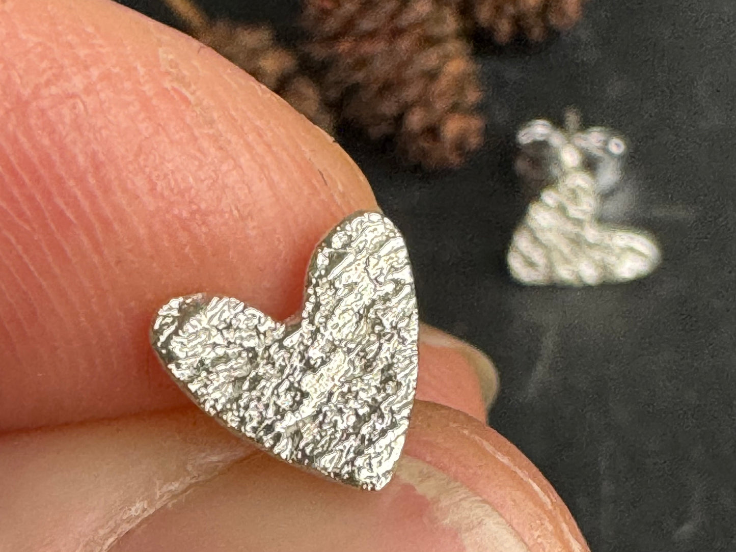 Handmade fine silver ripple heart stud earrings
