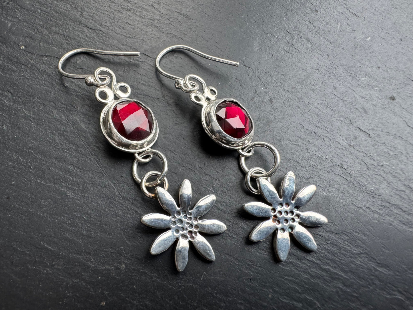 Garnet and Daisy silver dangly earrings.