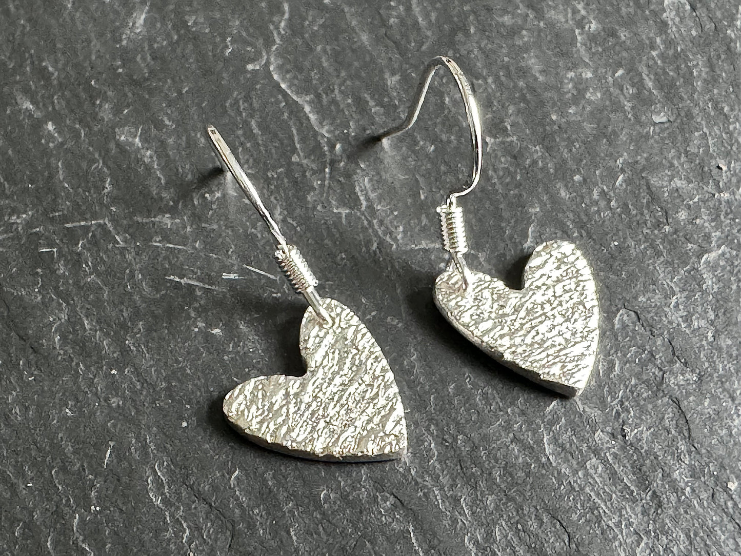 Ripple silver danglies