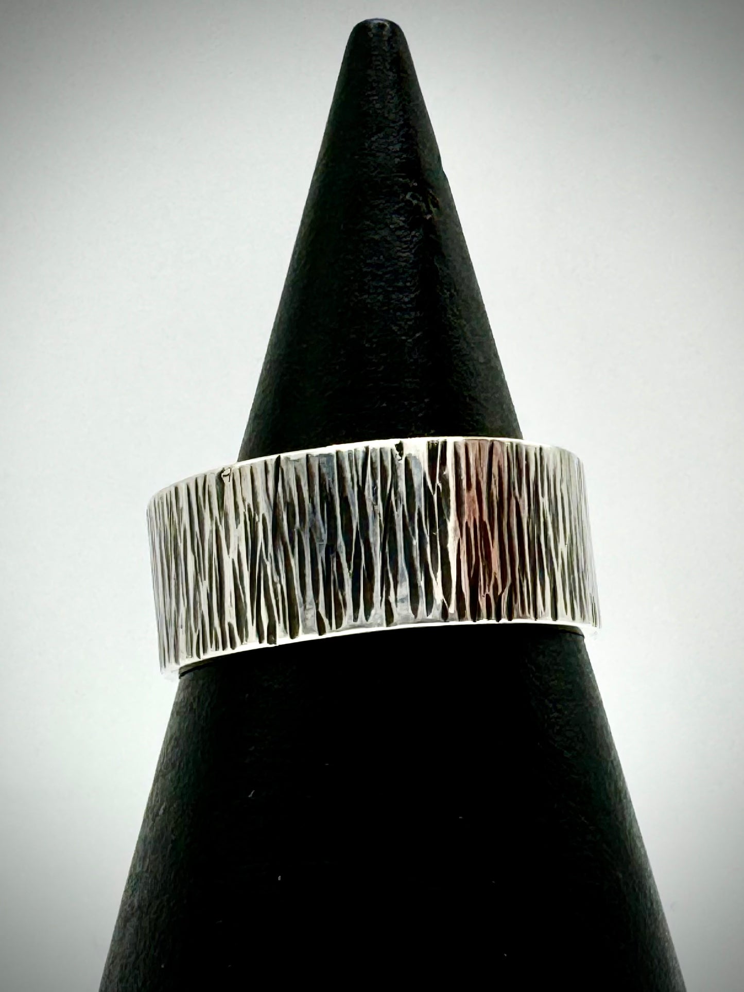 Silver hammered and oxidised wide ring