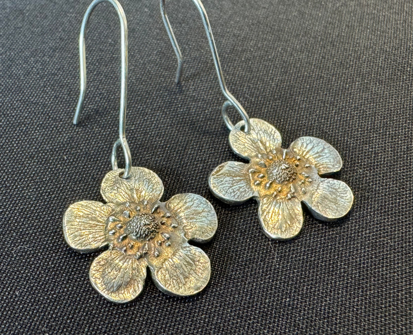 Handmade strawberry flower dangly earrings made from fine silver.