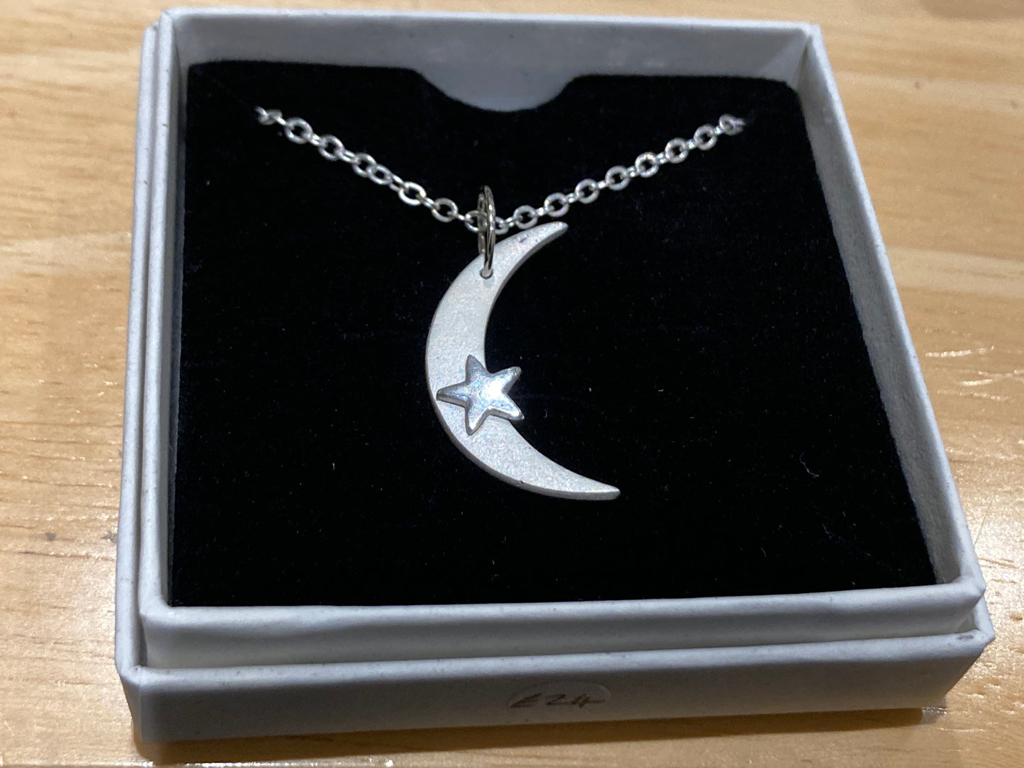 Fine silver moon and star necklace