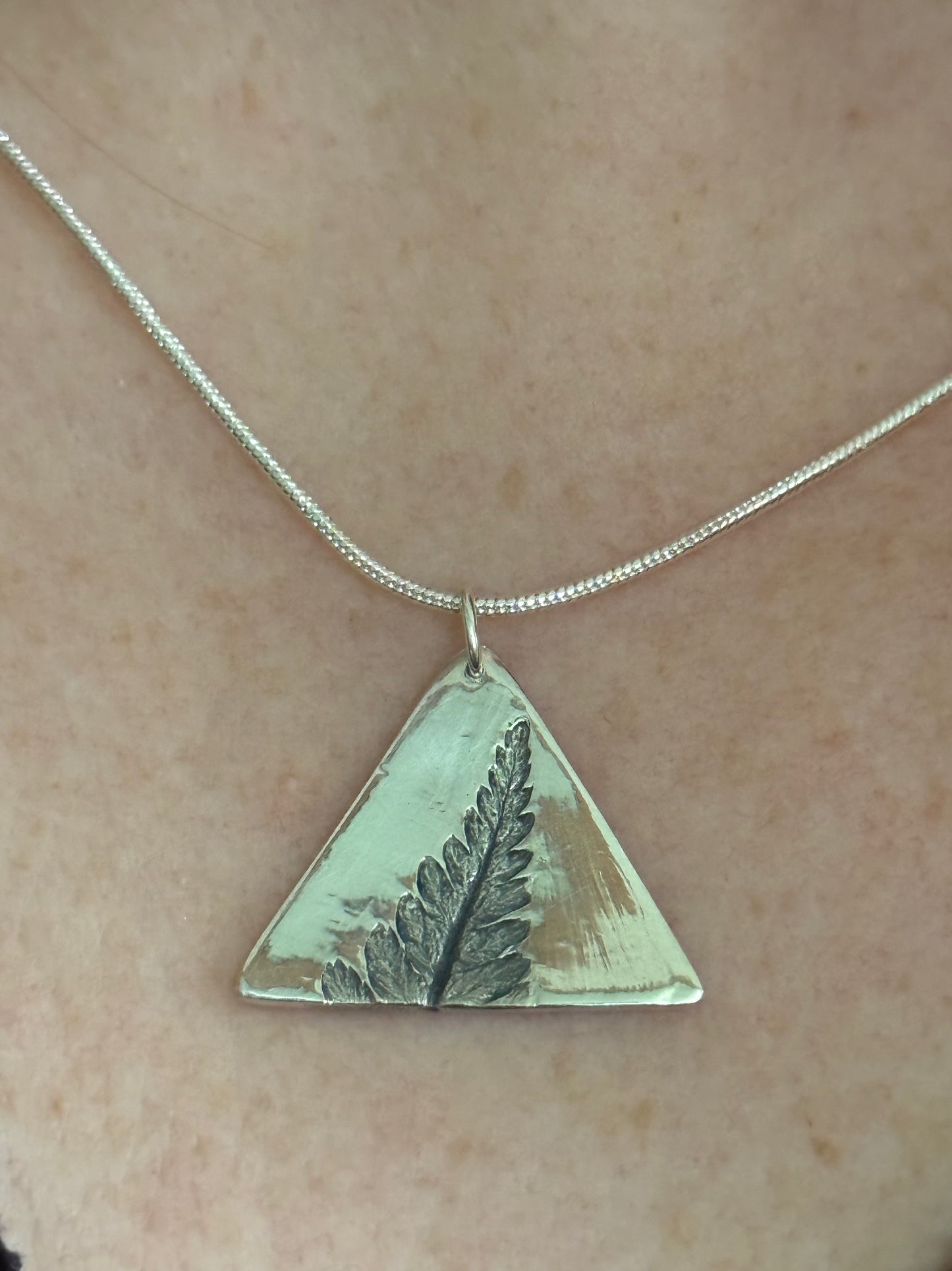 Fern imprint handmade triangle pendant in fine silver