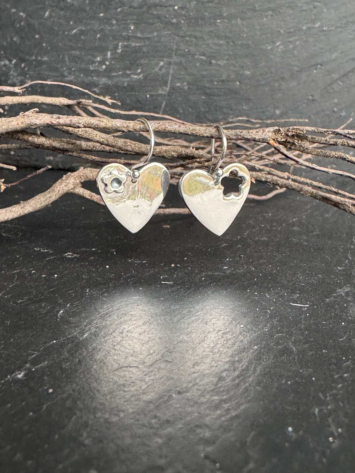 Handmade silver forget-me-not dangly heart earrings