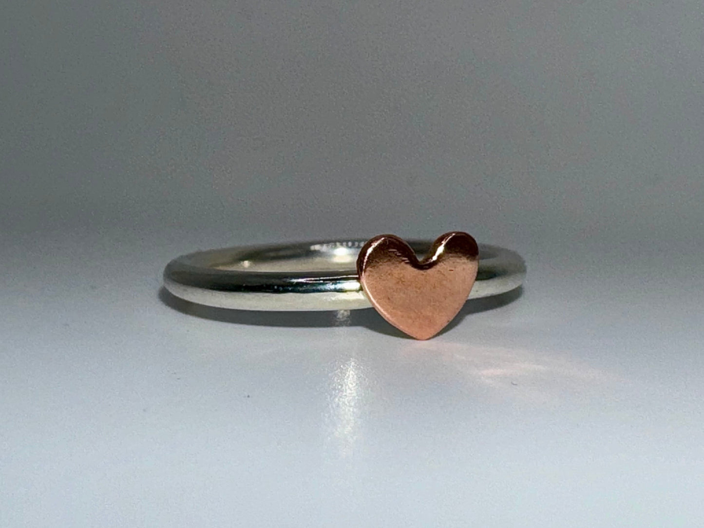 Sterling silver and copper heart ring.