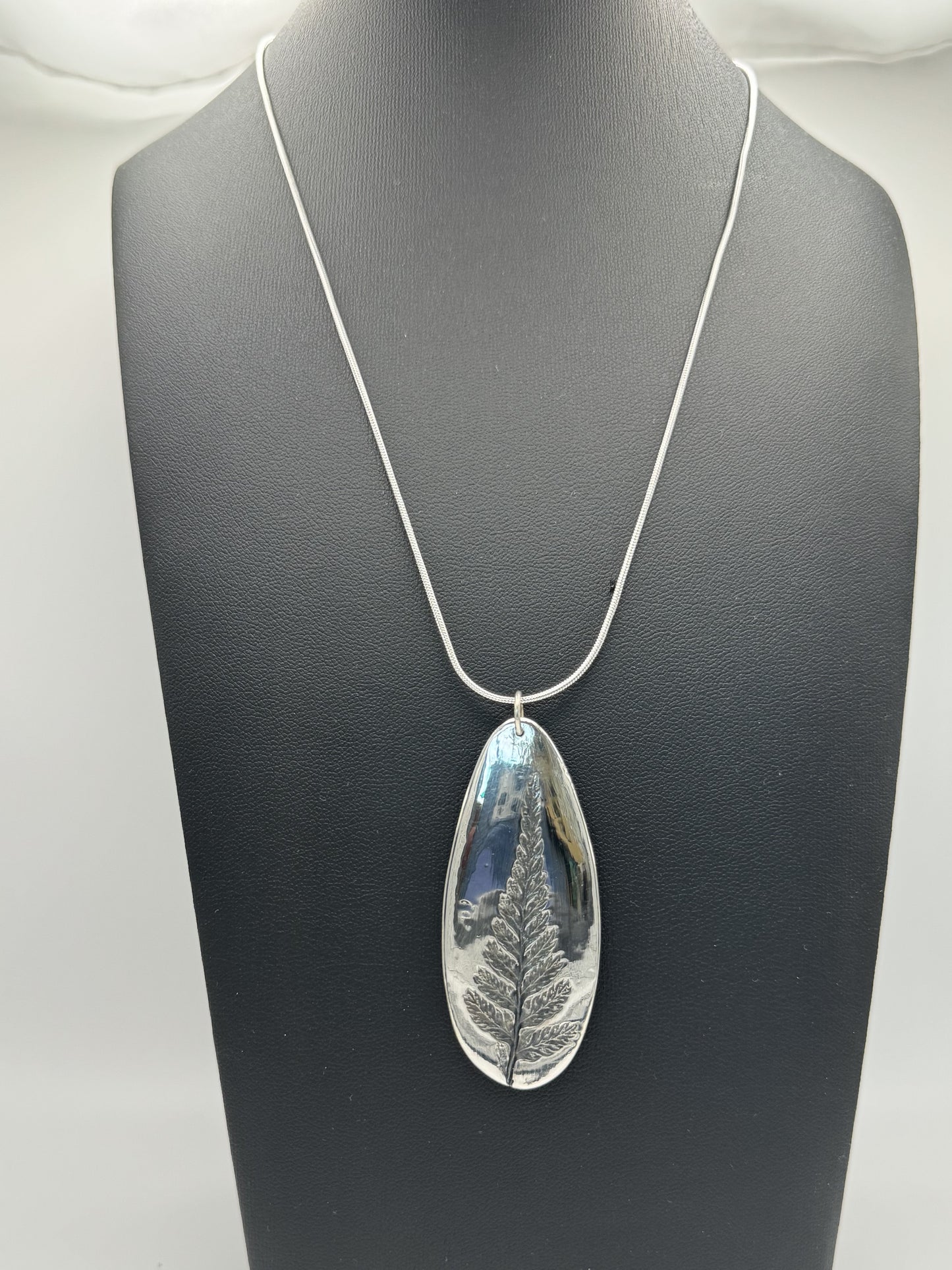 Fern imprint fine silver pendant