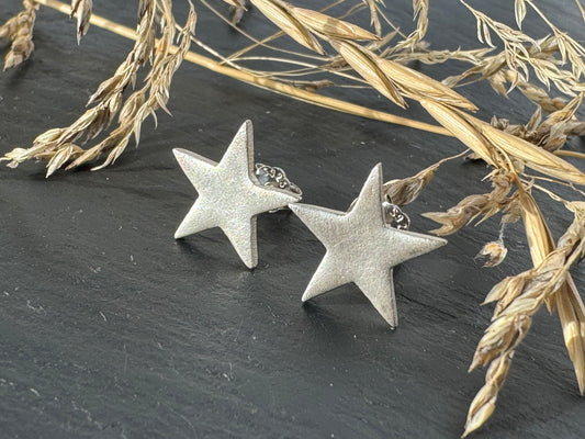 Fine silver star stud earrings