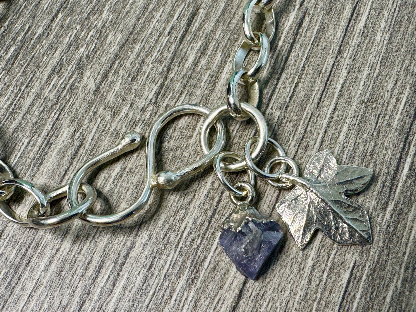 Sterling Silver Charm and Gem bracelet