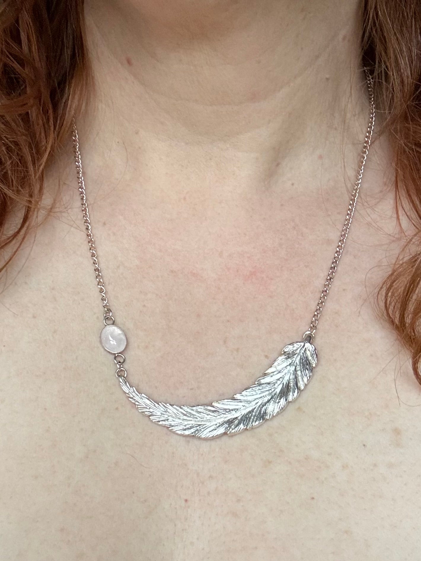 Handmade silver feather and rose quartz necklace