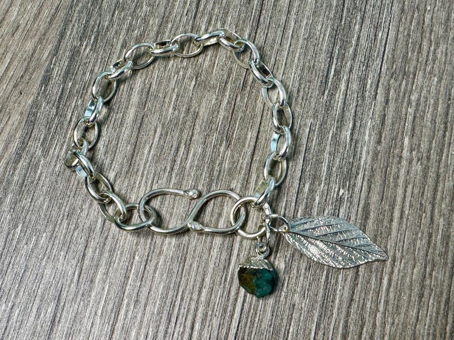 Sterling Silver Charm and Gem bracelet