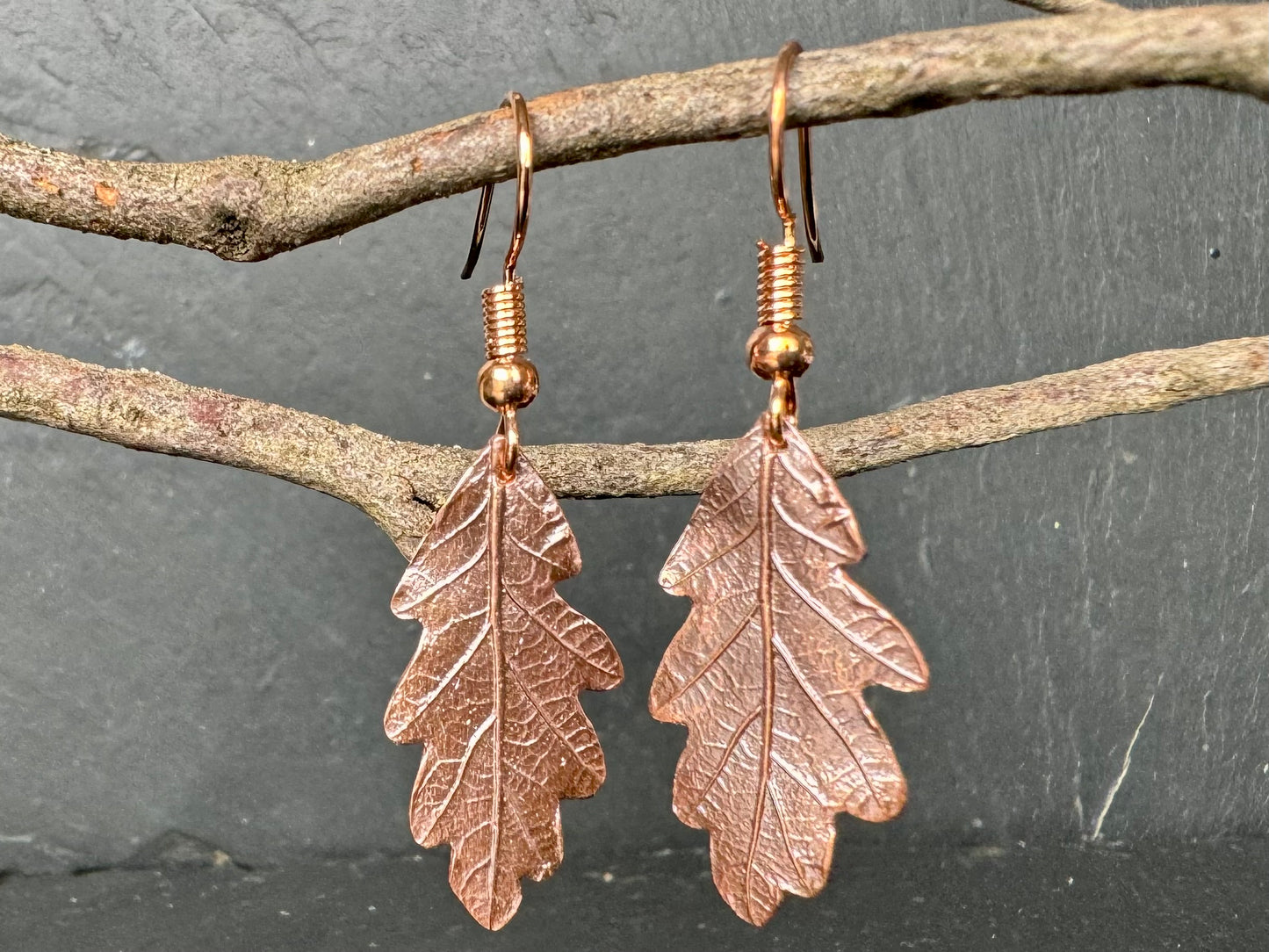 Baby oak leaf copper dangly earrings