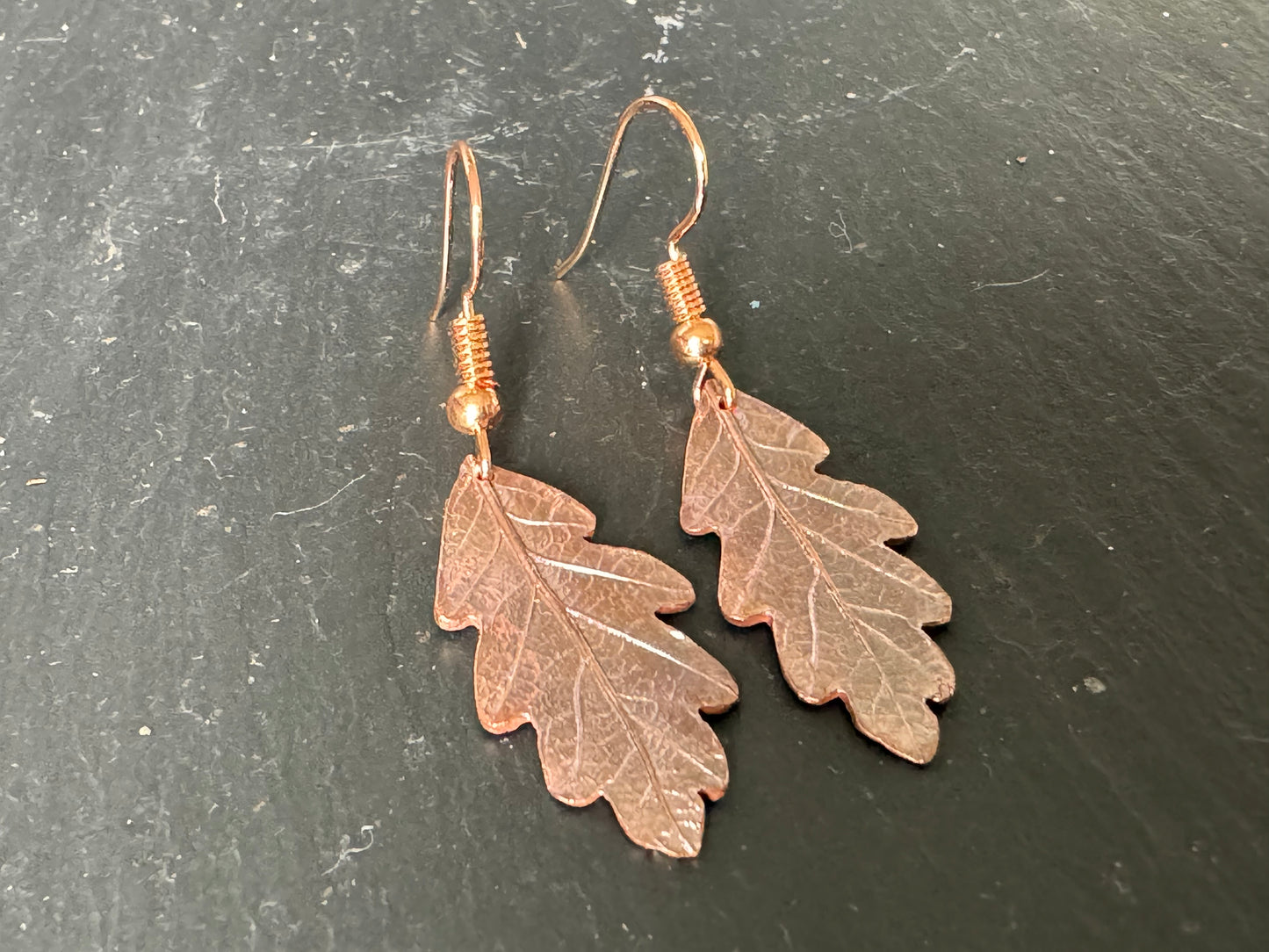 Baby oak leaf copper dangly earrings