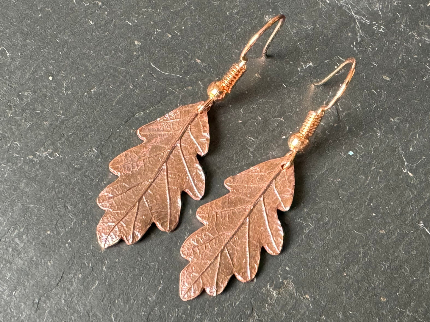 Baby oak leaf copper dangly earrings