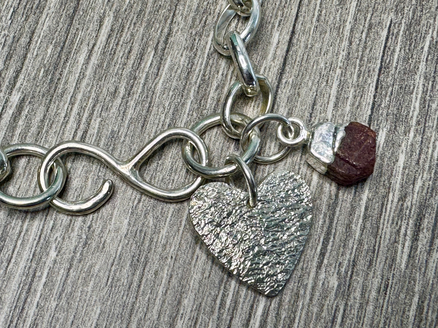 Sterling Silver Charm and Gem bracelet