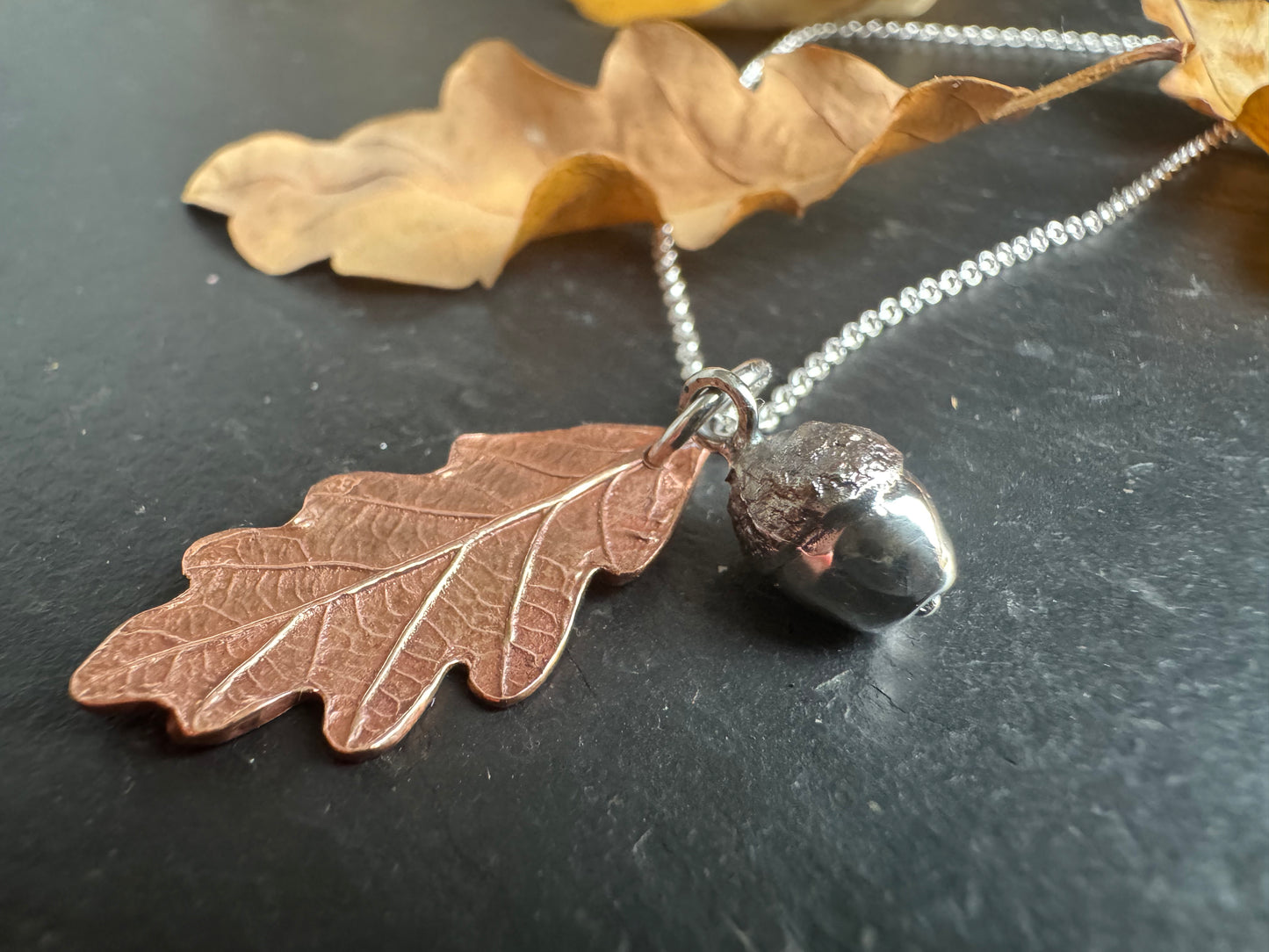 Copper baby oak leaf and silver acorn pendant