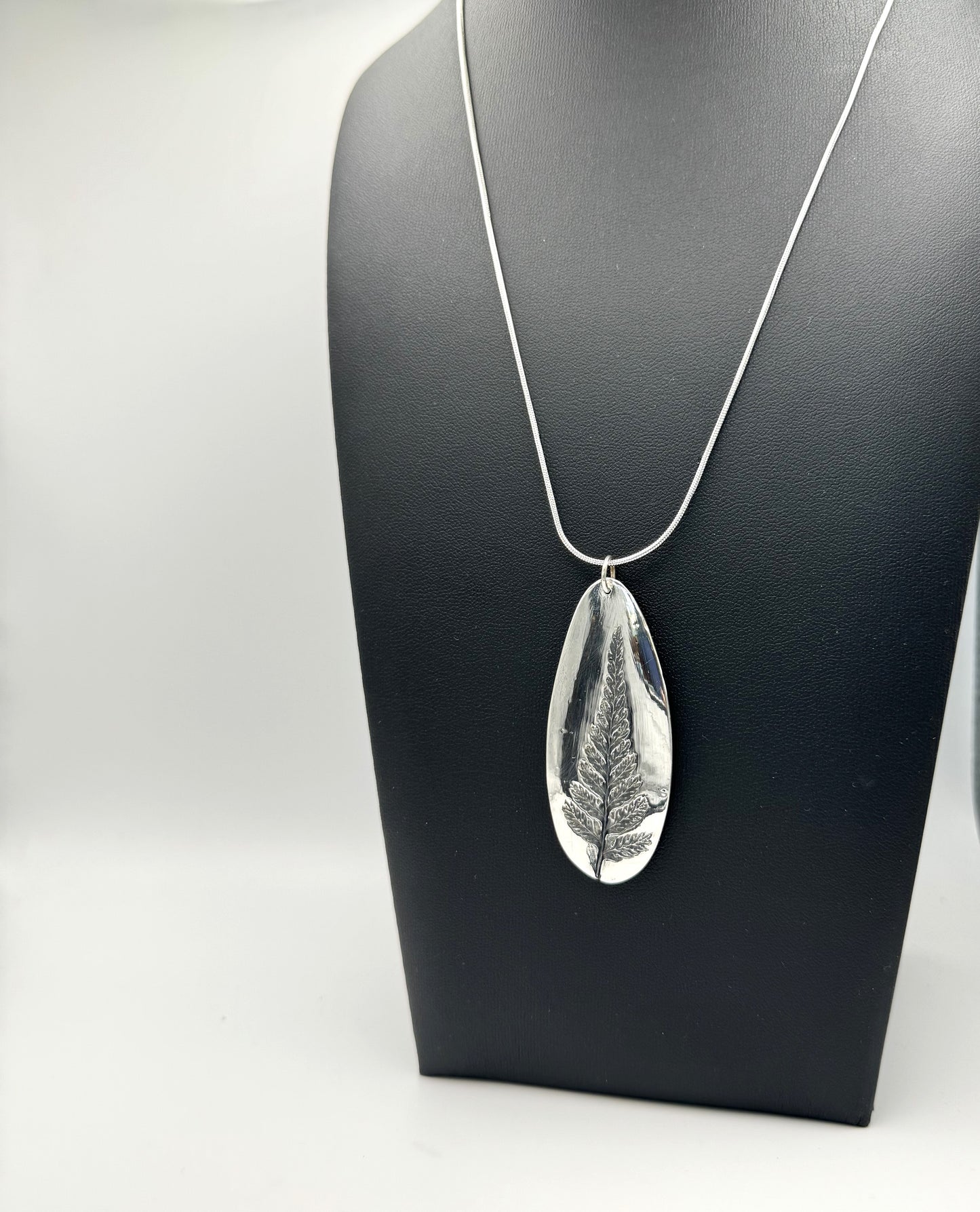 Fern imprint fine silver pendant